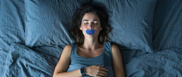 woman sleeping wears mouth sleep tape