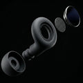 earplugs taken apart with dark background