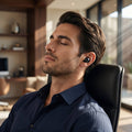 man sits with earplugs
