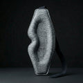 Gray eye mask on a black background