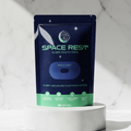 Space Rest sleep mouth tape packaging on a marble background